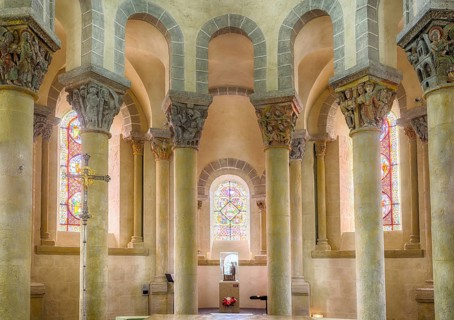 Capitals with colourful paintings, church of Saint-Nectaire