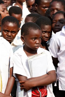 Group of students in schoolyard during morning assembly