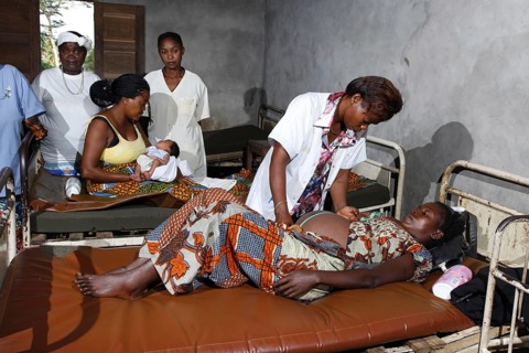 Pregnant woman being examined by a doctor