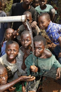 Boys at a waterhole