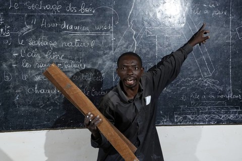 Teacher at blackboard
