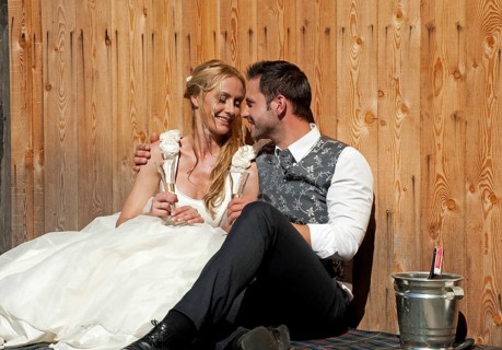Wedding couple celebrating with champagne