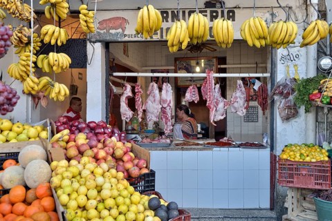 Butcher shop with fruit stand