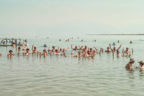 Tourists bathing in the Dead Sea