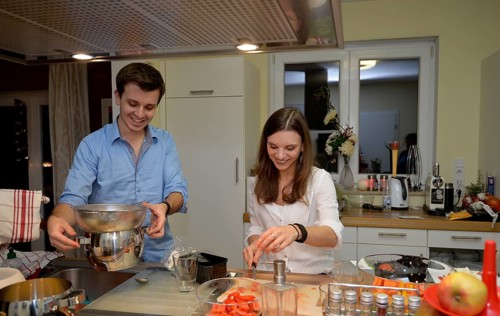 Young couple cooking together