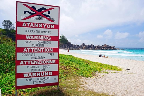 Sign with warning in several languages