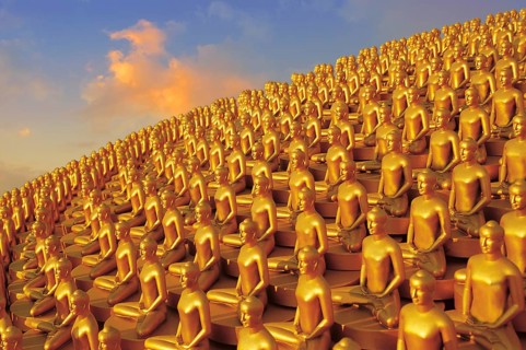 Small golden Dhammakaya Buddha statues at the Chedi