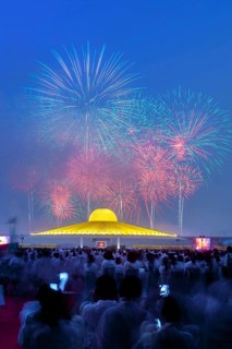 Fireworks behind the Chedi Mahadhammakaya Cetiya of the Wat Phra Dhammakaya temple