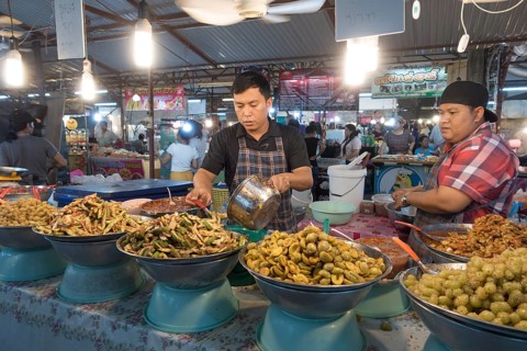 Market stall with pickled Thai fruits