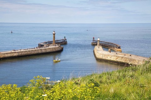 Entrance to Whitby Harbour with lighthouses