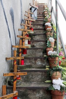 Stairs with crosses and flowers