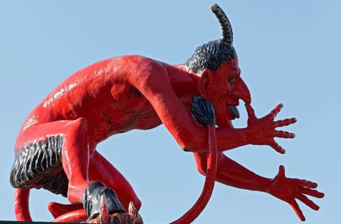 Devil thumbing his nose