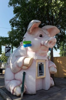 Figure of a pig as ATM