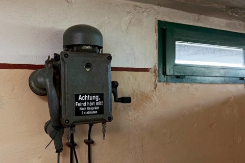 Telephone in a bunker from the 2nd World War with inscription
