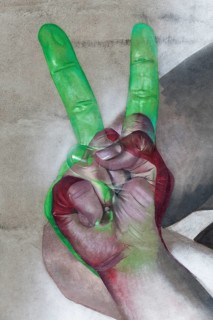 Clenched fist making Victory sign