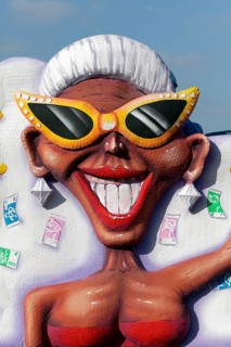 Tanned woman in bikini with sunglasses
