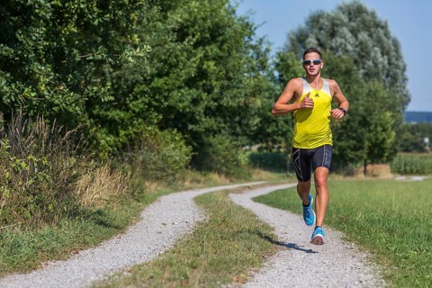 Runner on a gravel road