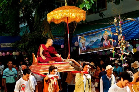 Family taking part in the annual Poi Sang Long Festival when young boys enter the temple as novice monks