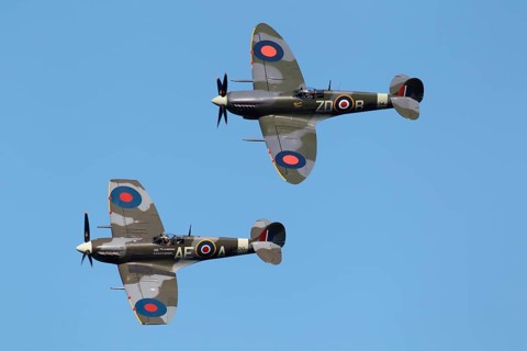 Two Supermarine Spitfire aircraft from the Royal Air Force