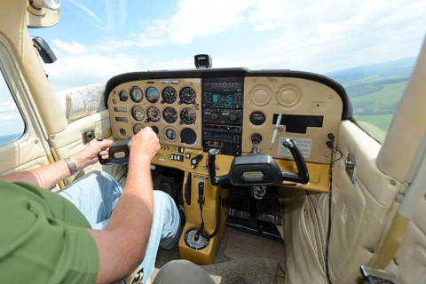 Inside view of single-engined sports plane cockpit