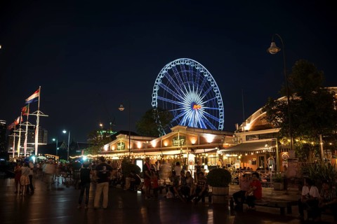 Asiatique Riverfront promenade with Ferris wheel at night
