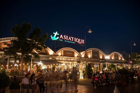 Asiatique Riverfront promenade with Ferris wheel at night
