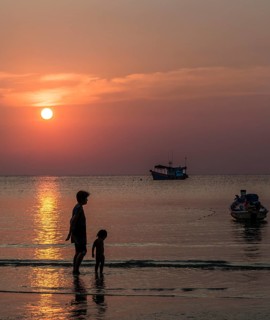 Woman and child in water