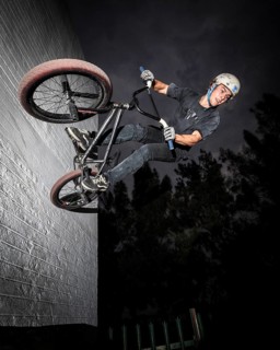 Teenager with BMX bike at skate park