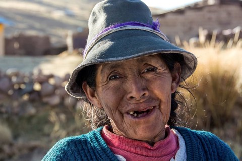 Indigenous woman with hat