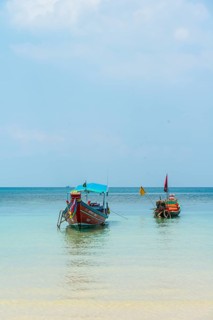 Longtail boats on the sea