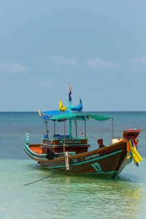 Longtail boat in the turquoise sea