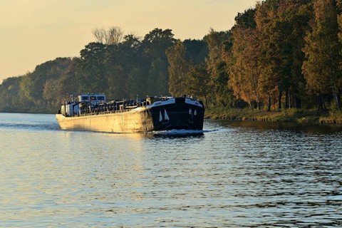 Black Cargo Ship Yggdrasi on the Mittelland Canal