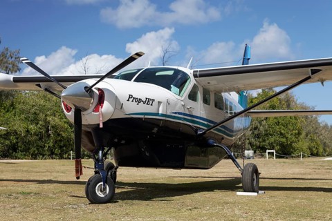Cessna Caravan 208 Sea Air on unpaved airfield