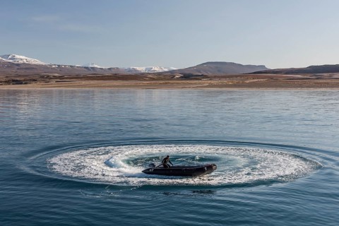 Guide in a Zodiac inflatable boat