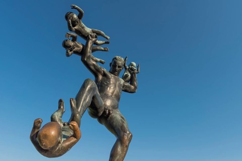 Man with four small children
