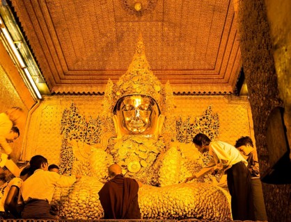 Buddha covered with small gold leaves