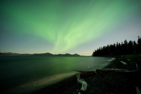 Aurora borealis and moonlight over Prince William Sound