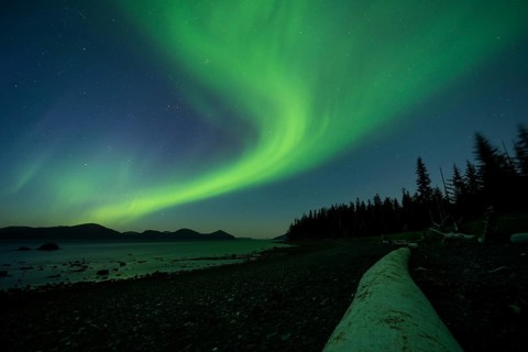 Aurora borealis and moonlight over Prince William Sound