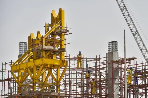 Construction workers at construction site of Khalifa International Stadium
