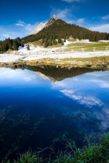 Walderkamp peak and Hundskopf reflected in a small lake