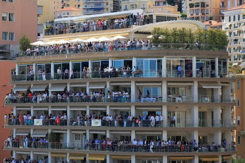Spectators on balconies in a high-rise building at the Formula 1 Grand Prix Monaco 2015