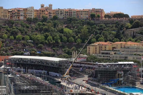 Pool and grandstands in front of Monaco's historic centre