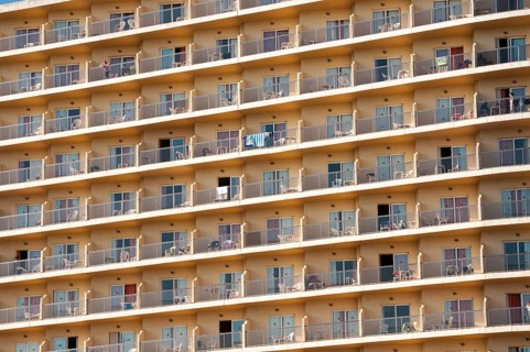 Rows of balconies on the facade of a large hotel complex in Torremolinos