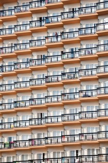 Rows of balconies on the facade of a large hotel complex in Torremolinos