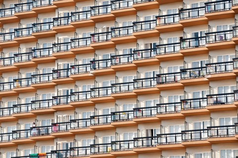 Rows of balconies on the facade of a large hotel complex in Torremolinos