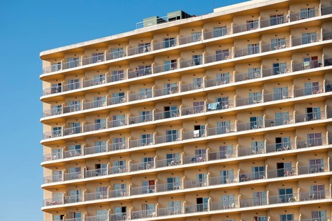 Rows of balconies on the facade of a large hotel complex in Torremolinos