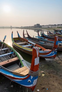 Fishing boats at the shore of Taungthaman Lake near the U Bein Bridge
