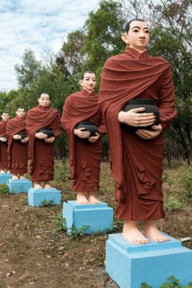 Row of statues of the 500 Arahant followers of Buddha at Win Sein Taw Ya