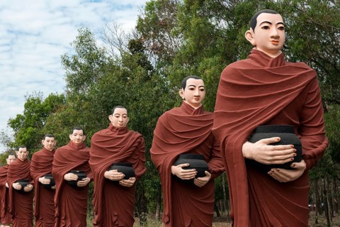 Row of statues of the 500 Arahant followers of Buddha at Win Sein Taw Ya