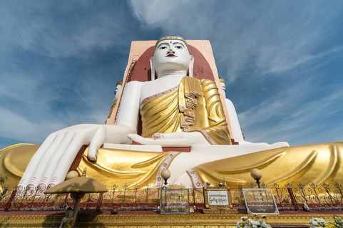 Buddha statue at Kyaikpun Pagoda in Bago